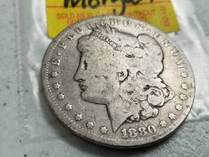lot 42 image: 1880 MORGAN SILVER DOLLAR