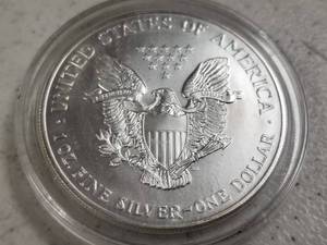 lot 54 image: 1999 COLOR ENHANCED AMERICAN SILVER EAGLE 1 TROY OZ .999 FINE SILVER