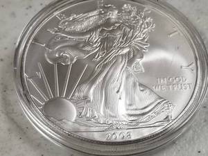 lot 61 image: 2008 AMERICAN SILVER EAGLE 1 TROY OZ .999 FINE SILVER IN AIRTITE