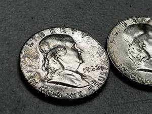 lot 64 image: 2 BU-UNC TONED FRANKLIN HALF DOLLARS 1962 1962-D