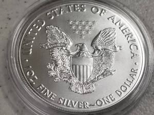 lot 69 image: 2019 COLOR ENHANCED AMERICAN SILVER EAGLE IN AIRTITE