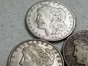 lot 70 image: 3 MORGAN SILVER DOLLARS 1921 P-D-S