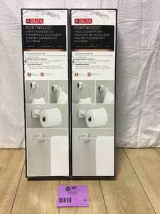 lot 18 image: Lot of two Portwood 4-Piece Bath Accessory Set in Chrome with 24 in. Towel Bar, Toilet Paper Holder, Towel Ring and Towel Hook by Delta