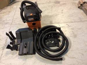 RIDGID 5 Gal. 5.0-Peak HP Portable Wall-Mountable WetDry Shop Vacuum with Filter, Hose and Accessories