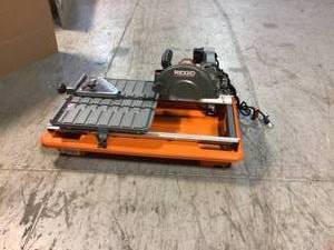 lot 11 image: RIDGID 9 Amp Corded 7 in. Wet Tile Saw