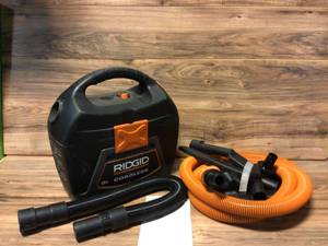 lot 12 image: RIDGID 3 Gal. 18-Volt Cordless Handheld WetDry Shop Vacuum (Tool Only)Open box customer returns see pictures