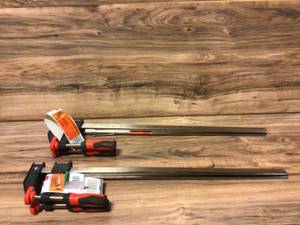 lot 84 image: BESSEY Clutch Style 24 in. Capacity Bar Clamp with Wood Handle and 2-12 in. Throat Depth