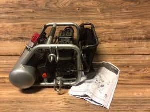lot 87 image: Husky 1 Gal. Portable Electric-Powered Silent Air Compressor