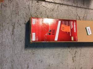 lot 90 image: Husky 8 in. x 55 in. Slat Wall Panel Starter Kit