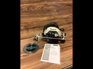 lot 26 image: Makita 18-Volt 6-12 in. LXT Lithium-Ion Sub-Compact Brushless Cordless Circular Saw (Tool Only) Customer Returns See Pictures