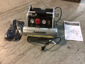 lot 27 image: Husky 1 Gal. Portable Electric-Powered Silent Air Compressor Customer Returns See Pictures