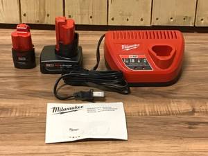 Milwaukee M12 12-Volt Lithium-Ion 4.0 Ah and 2.0 Ah Battery Packs and Charger Starter Kit Open Box customer return see pictures