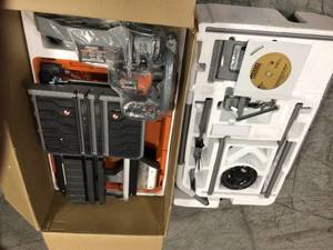 Ridgid 10 in. Wet Tile Saw with Stand in like new condition customer return see pictures