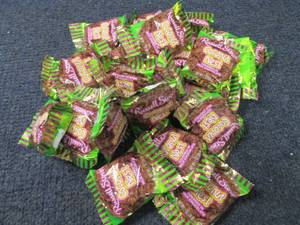 lot 117 image: 24 Russel Stover Coconut Nests...