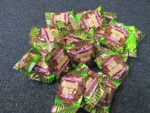 lot 118 image: 24 Russel Stover Coconut Nests...