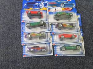 lot 180 image: 8 Assorted Hot Wheels Vehicles...
