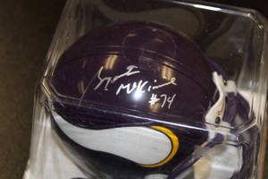 lot 79 image: Minnesota Vikings Riddell Mini Helmet Bryant McKinnie Autograph