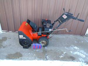 lot 2 image: Spirit 825 snow blower. 2 stage. Good used condition. May need a little tlc. Tested & works. As shown.