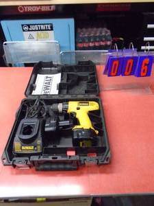 lot 6 image: Dewalt 12 volt drill set with 2 batteries & charger. Batteries seem weak. As shown.