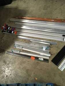 lot 38 image: Large Lot of assorted door thresholds and moldings various sizes models and conditions see pictures