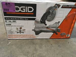 lot 16 image: 15 Amp Corded 12 in. Dual Bevel Miter Saw with LED by RIDGID in like new working conditions