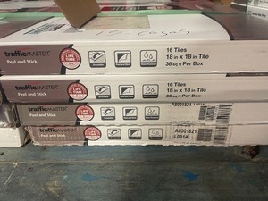 lot 46 image: Pallet with 15 cases of TrafficMaster Groutable 18 in. x 18 in. Light Travertine Peel and Stick Vinyl Tile (36 sq. ft.  case)