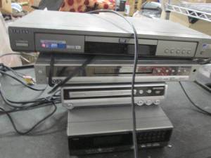 lot 93 image: 3 dvd players and 1 vhs player ...