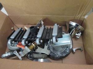 lot 183 image: box of wheels, faucet parts and fle...