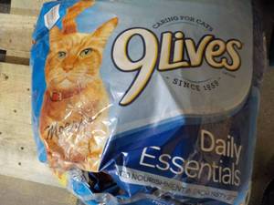 9 Lives Cat Food damaged Bag...