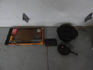 lot 10 image: Cast Iron Dutch Oven Stamped Made In USA & 6 Skillet Made In USA & Large Reversible Griddle With Meat Press