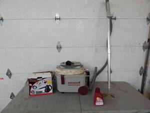 lot 24 image: Bissell Power Steamer & Singer Laser Steamer Hand Held