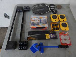 lot 52 image: Forearm Forklift, Floor Care Pads, Super Slider Furniture Moving  Pads & Other Moving Related Items