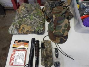 lot 79 image: Hunting Shorts Size 40, Hunting Pants, Deer Calls & More