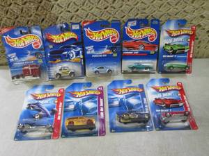 lot 261 image: (C-4) Assorted Hot Wheels in Packag...