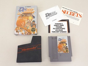 lot 12 image: Nintendo NES Double Dribble Game wOriginal Box, Papers, and Foam Insert