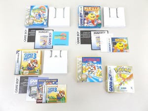 lot 31 image: Lot of Misc Gameboy Boxes, Inserts, Papers, etc. (NO GAMES)