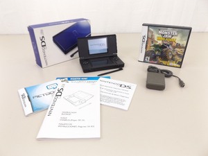 lot 32 image: Cobalt Blue Nintendo DS Lite wOriginal Box, Papers, Charger, and Monster Jam Game
