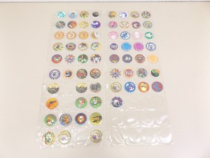 lot 37 image: Lot of Vintage POGS in Protective Sleeves