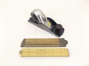 lot 78 image: Vintage Stanley Wood Rulers and #110 Wood Plane