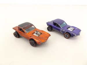 lot 103 image: 2 Original Hot Wheels Redlines Python Purple and Red Color Variations