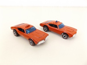 lot 104 image: 2 Original Hot Wheels Redlines Olds 442 Red Fire Variations