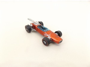 lot 122 image: Original Hot Wheels Redline Red Brabham Repco