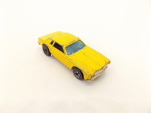 lot 127 image: Original Hot Wheels Redline Yellow Monte Carlo Stocker Tampo Error