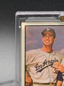 lot 65 image: 1961 Topps Sandy Koufax Baseball Card #207