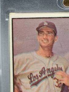 lot 128 image: 1961 Topps Sandy Koufax Baseball Card #207