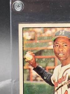 lot 136 image: 1961 Topps Hank Aaron Baseball Card #415