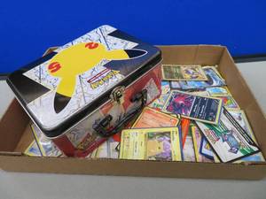 lot 17 image: POKEMON METAL TRAIN ON  BOX WITH MISC CARDS