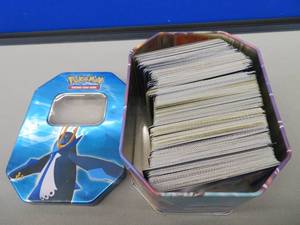 lot 18 image: TIN POKEMON BOX WITH CARDS