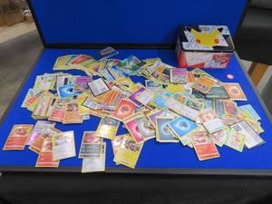 lot 24 image: POKEMON CARDS WITH POKEMON BOX