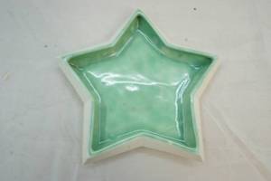 lot 71 image: ceramic star